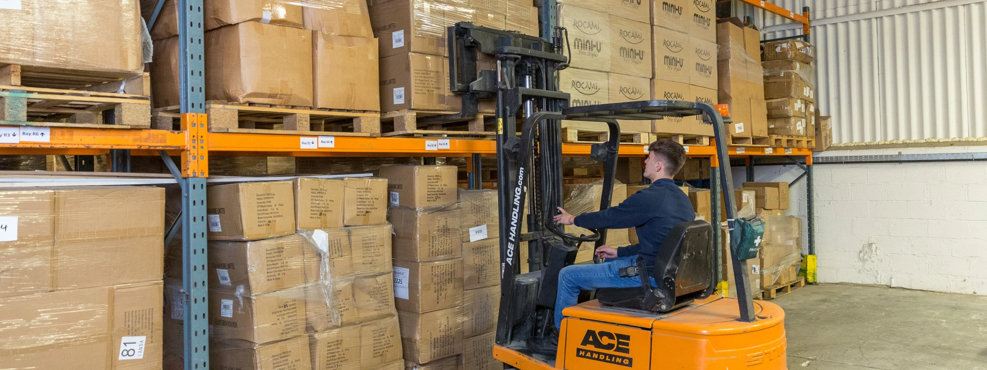 Forklift being operated in the warehouse